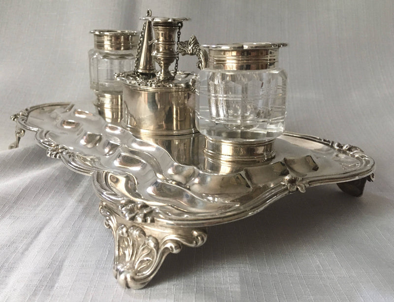 William IV silver inkstand with twin inkwells and taperstick holder with snuffer. London 1834 Joseph Angell I & John Angell I. 16 troy ounces.