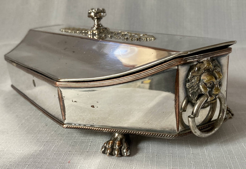 19th century Sheffield Plated octagonal inkstand with lion mask handles & lion paw feet, circa 1830 - 1850.