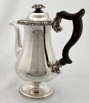 Late Georgian Sheffield plated pedestal coffee pot with foliate decoration. Circa 1825.