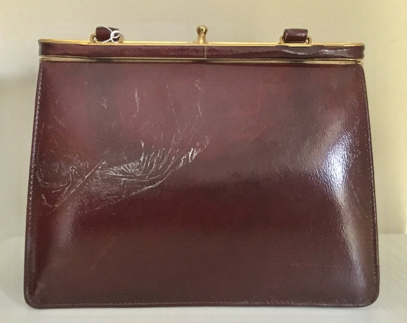 Vintage Bergundy Patent Leather Handbag by Widegate of London.