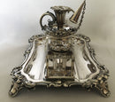 William IV period Sheffield plated inkstand with central taperstick holder. Circa 1835 - 1840
