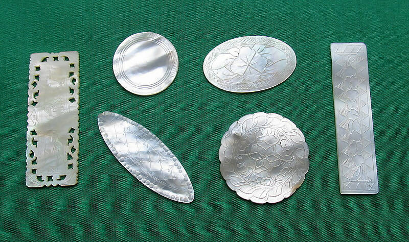 Collection Of Six Decorated Mother Of Pearl Gaming Counters