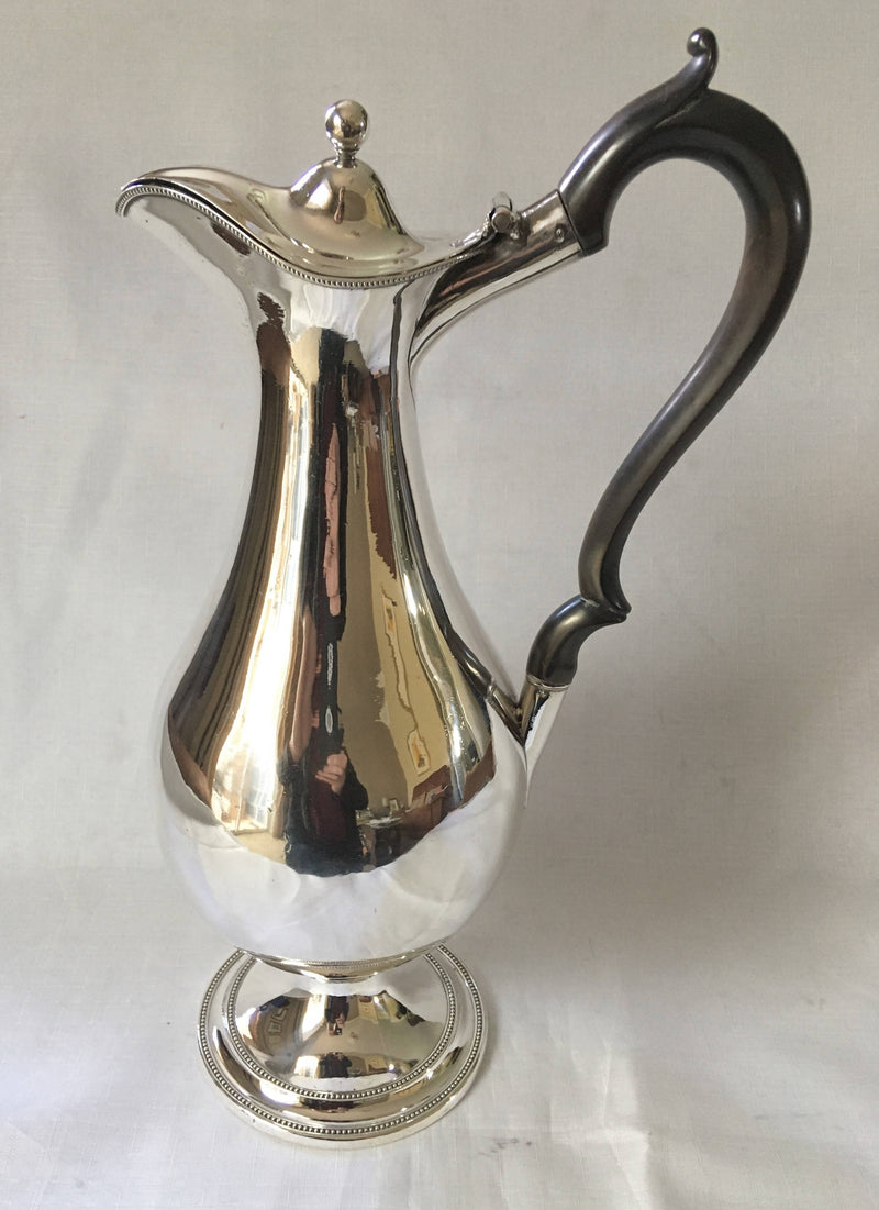 Large, early 19th century, silver plated wine jug of baluster form.