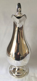 Large, early 19th century, silver plated wine jug of baluster form.