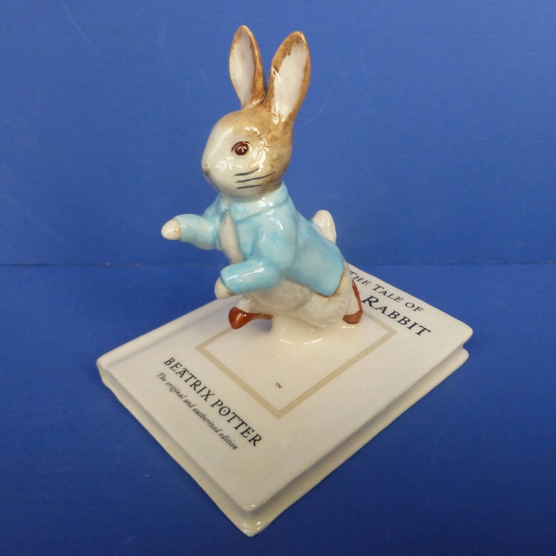 Beswick Beatrix Potter Figurine - Peter On His Book