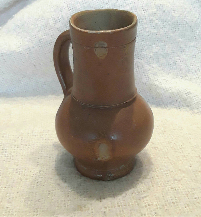 Stuart Ware A Stuart Period Stone ware Juglet.