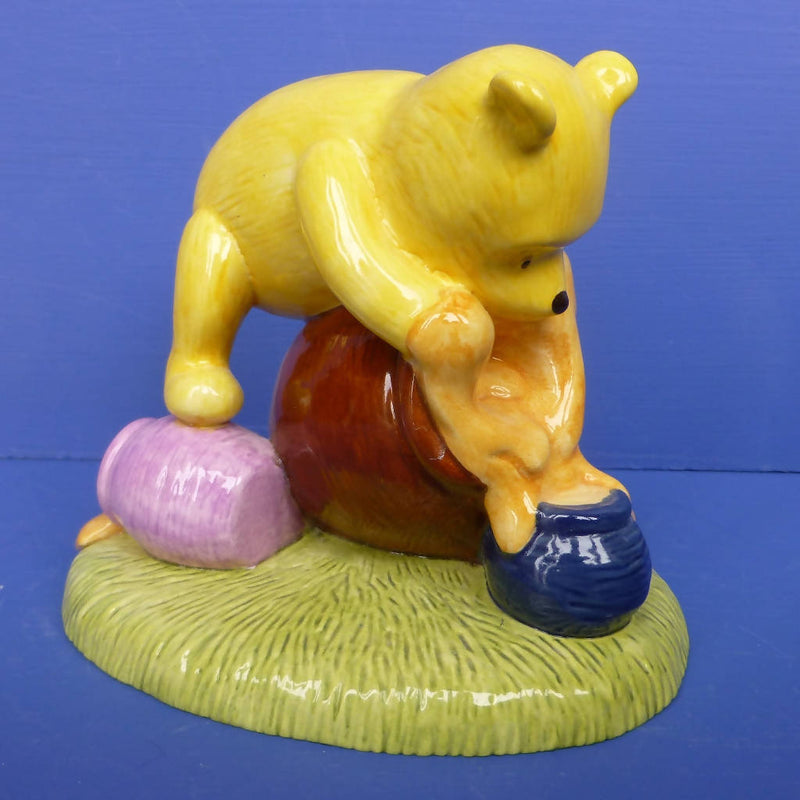 Royal Doulton Winnie The Pooh Figurine - Isn't It Funny How A Bear Likes Honey WP60
