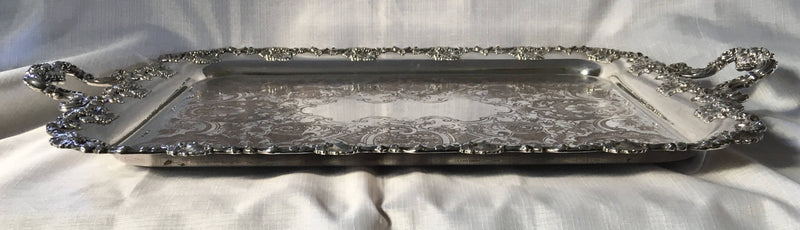 A 19th century ornate Sheffield Plated twin handled serving tray.