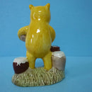 A Boxed Royal Doulton Winnie The Pooh Figurine - Pooh Counting The Honeypots