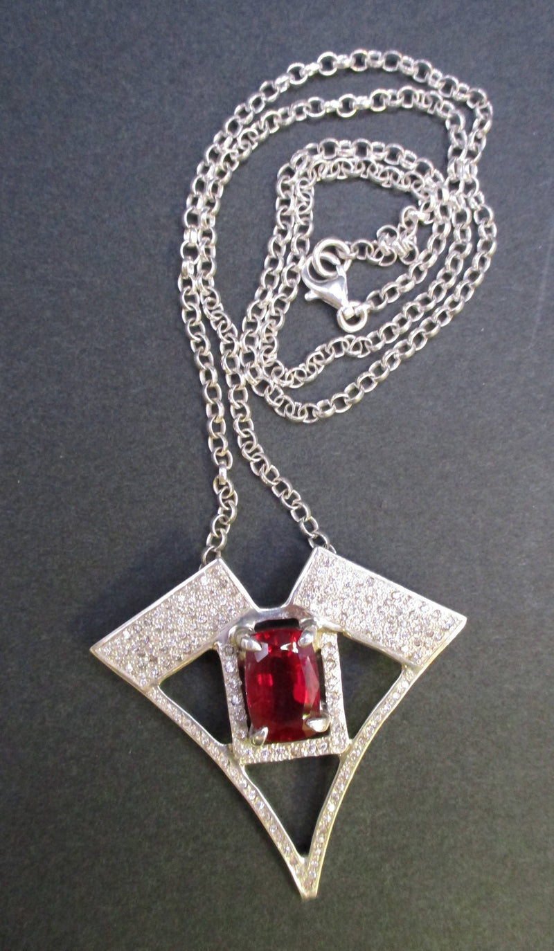 Jake: Ruby and zirconias silver pendant