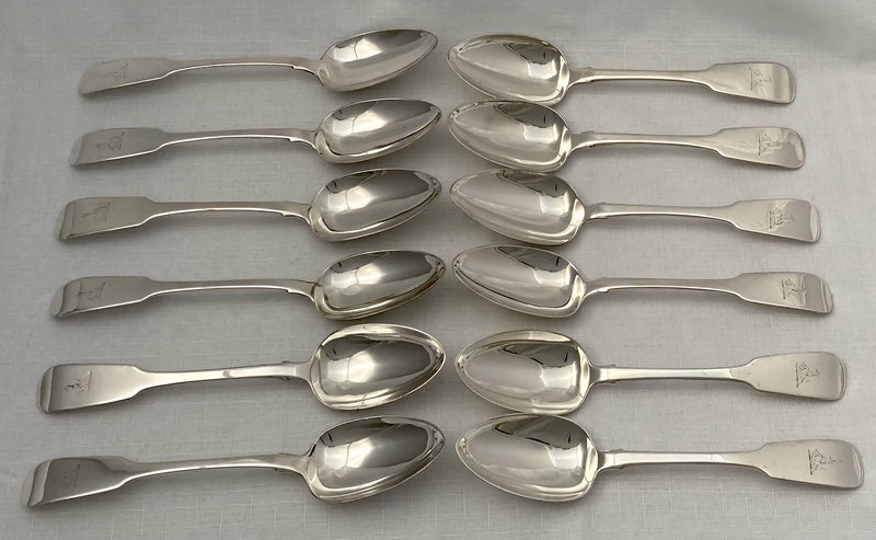 Georgian, George IV, Set of Twelve Crested Irish Silver Tablespoons. Dublin 1825-28 William Cummins. 30 troy ounces.