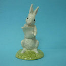 A Royal Doulton Winnie The Pooh Figurine Rabbit Reads The Plan WP23 - In Excellent Condition.