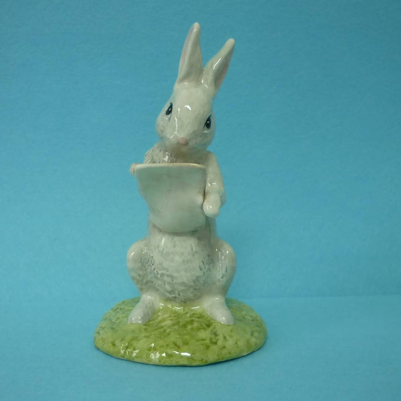 A Royal Doulton Winnie The Pooh Figurine Rabbit Reads The Plan WP23 - In Excellent Condition.
