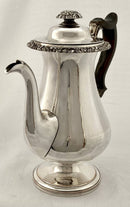 Late Georgian Sheffield plated pedestal coffee pot with foliate decoration. Circa 1825.