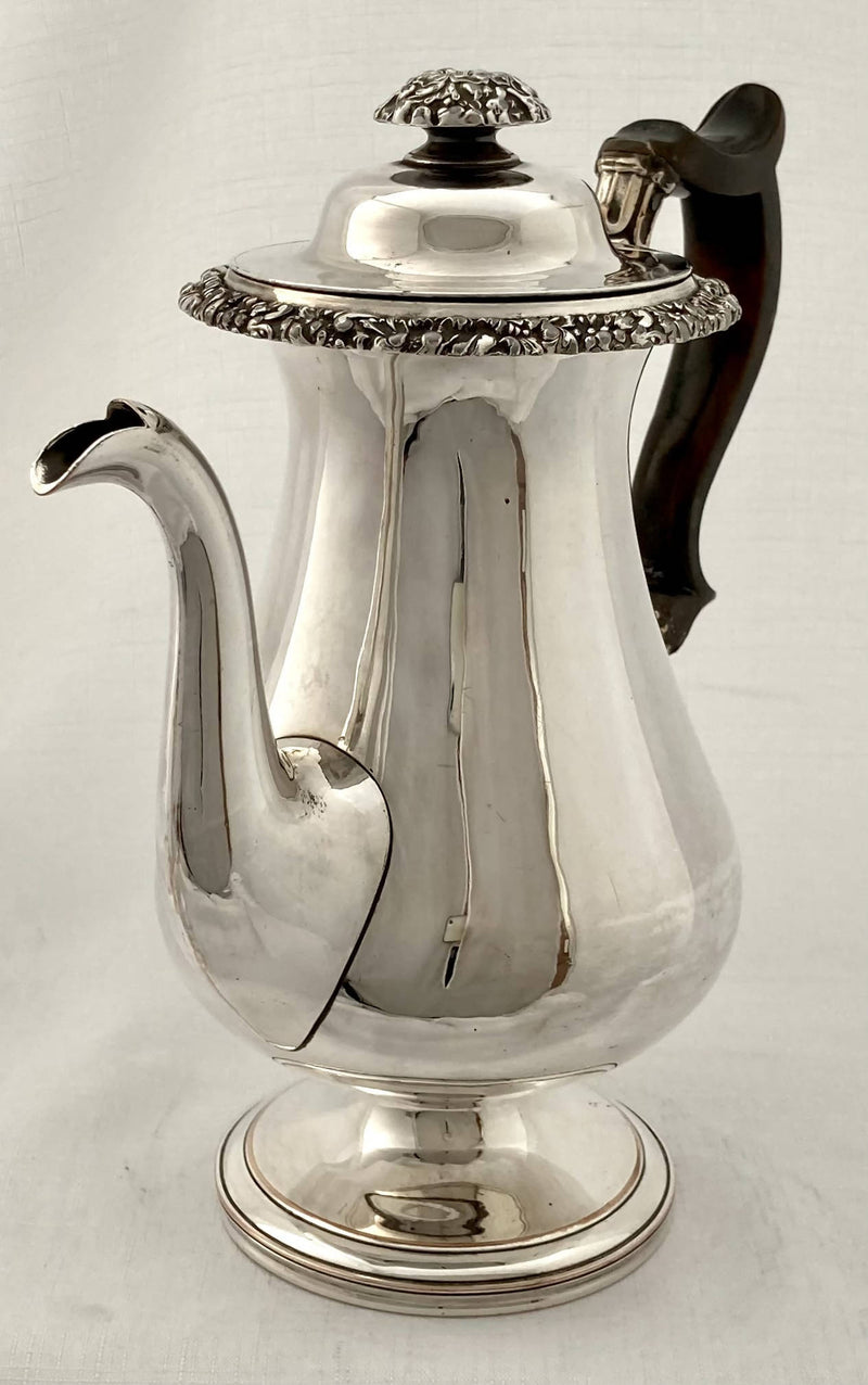 Late Georgian Sheffield plated pedestal coffee pot with foliate decoration. Circa 1825.