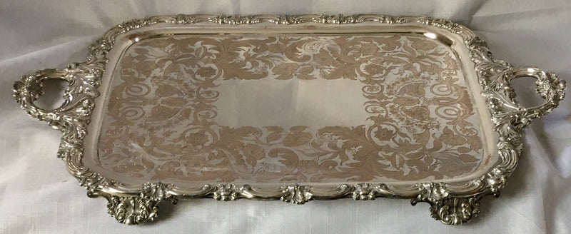 Georgian, George IV period, twin handled Old Sheffield Plate serving tray on four ornate feet. Circa 1820 - 1830.