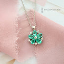 Platinum Emerald & Diamond Flower Cluster Pendant
