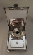 Georgian, Sheffield Plated crested inkstand raised on four bun feet. Circa 1820 - 1830.
