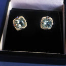 Silver Blue Topaz Stud Earrings