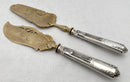 Pair of French Silver Handled Gilt Metal Servers, Circa 1890 - 1910.