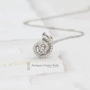 18ct White Gold Diamond Swirl Pendant