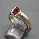 Jake: Silver and gold trillion cut garnet set ring