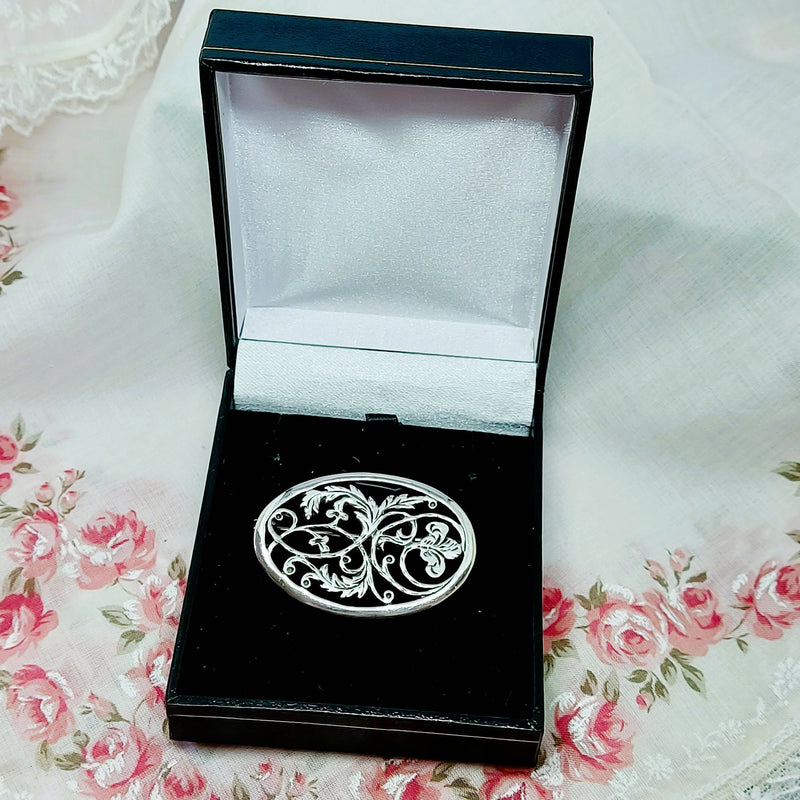 Silver Pierced Floral Brooch