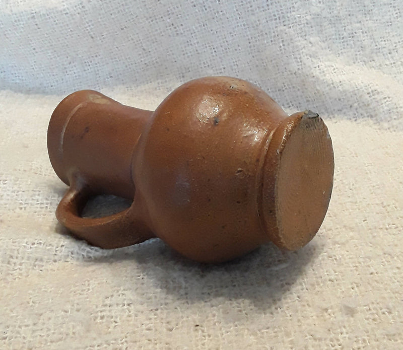 A Stuart Period Stone ware Juglet.