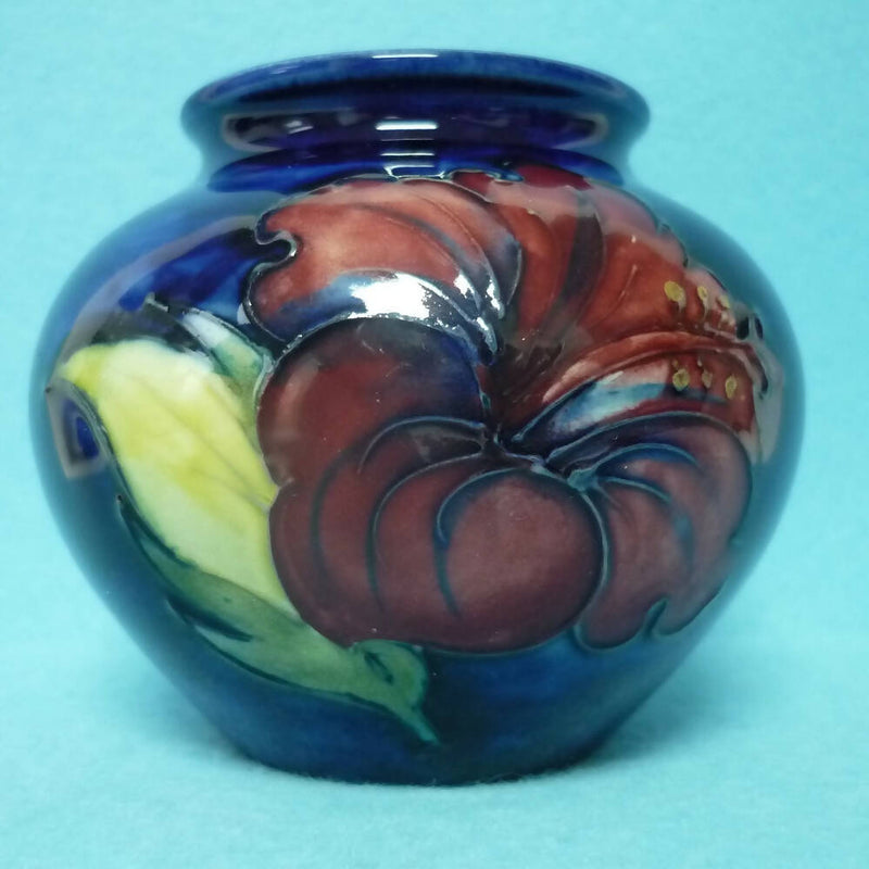 A Moorcroft Small Vase in the Hibiscus Pattern by Walter Moorcroft