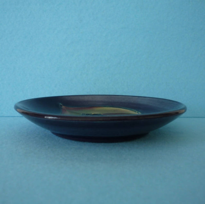 A Moorcroft Pin Dish in the Black Tulip Design by Sally Tuffin